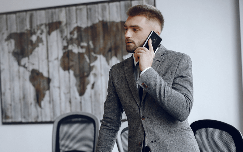 businessman-working-office-man-is-talking-phone-guy-business-suit-1.png